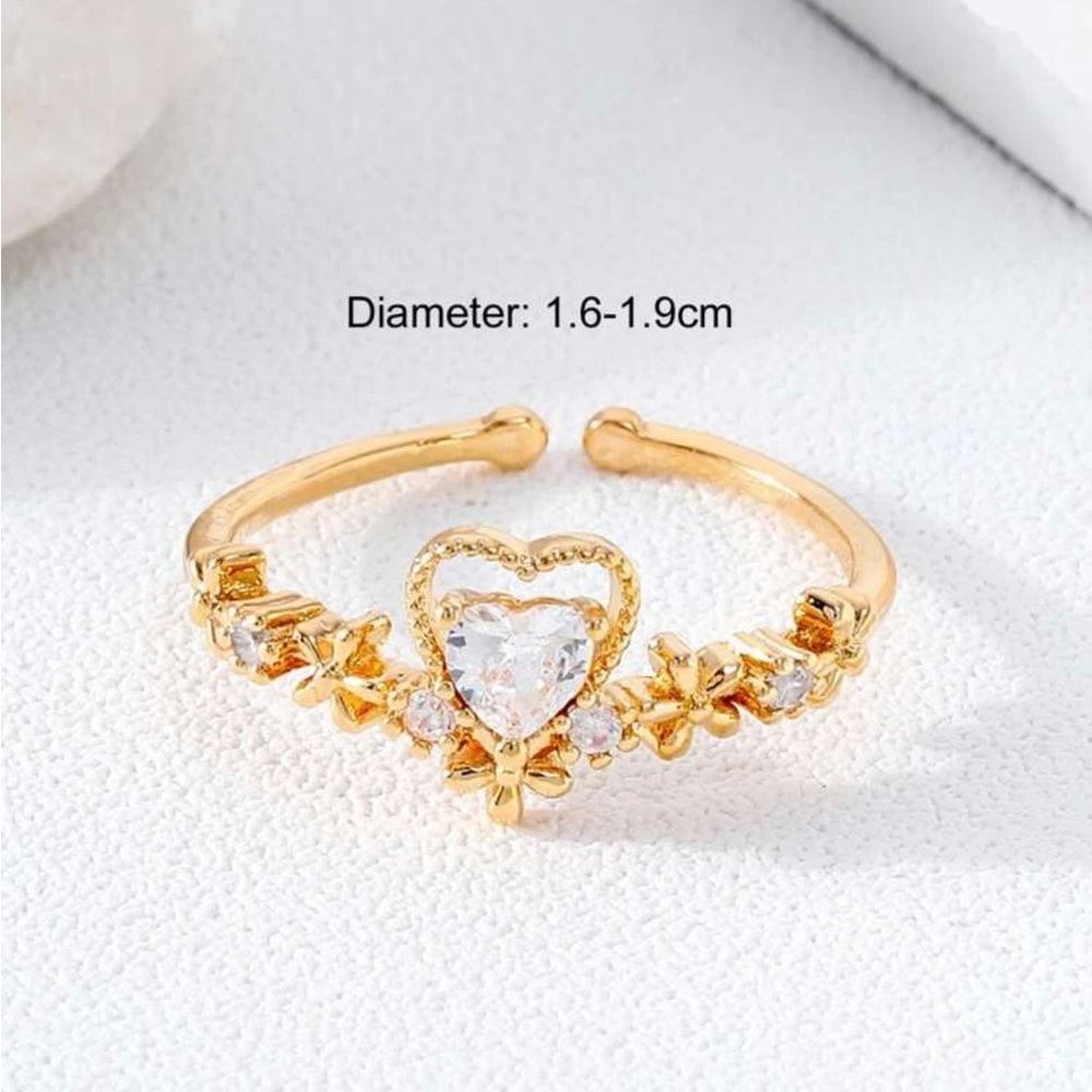 Gold colored princess ring